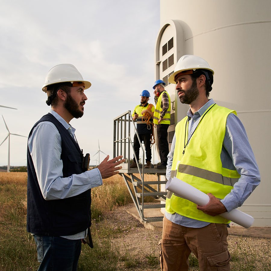 group-of-engineers-in-wind-power-station-renewable